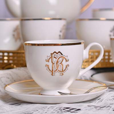 Cup and saucer White with luxury Gold logo