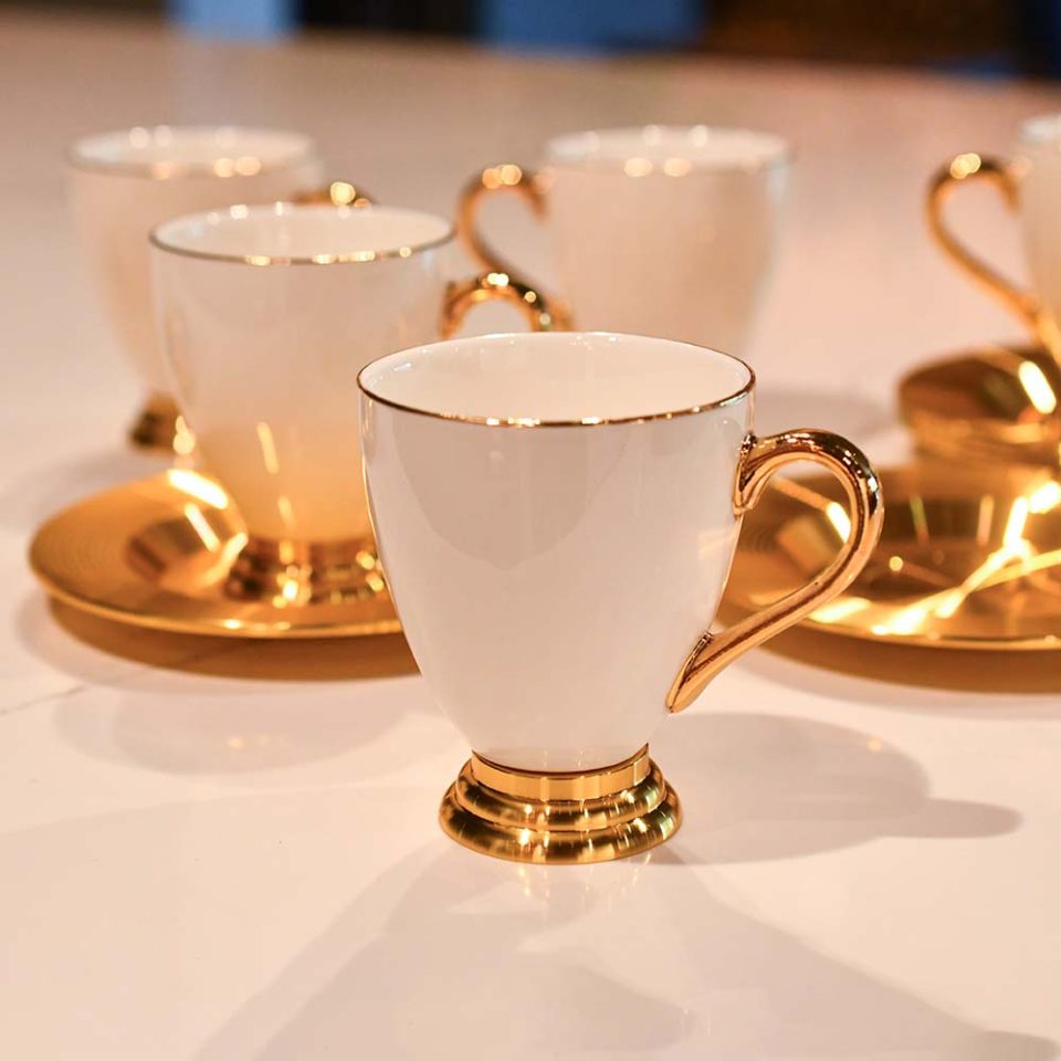 White coffee cup and gold plated saucer - photo 1